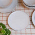 pearl white china bread plate with ribbed detail edging